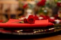 Horizontal photo close-up plate decorated with rosebuds for a romantic dinner