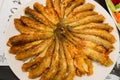 Plate of deep fried anchovies