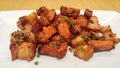 Plate of Deep Fried Crispy Pork Belly Cooked with Garlic and Pepper Sauce