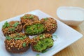 Plate of Delectable Falafels with Yogurt Dip