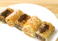 Delectable Roll Shaped Baklava Pastries in Different Flavors