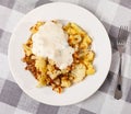 Plate of delicious boiled cauliflower with spicy sauce