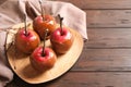 Plate with delicious caramel apples Royalty Free Stock Photo