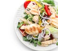 Plate with delicious chicken salad on white background