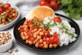 Plate with delicious chickpea curry on table, closeup