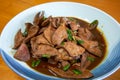 A plate of delicious Chinese home-cooked dishes, fried pork liver with sauce