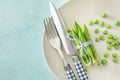 Plate with delicious fresh green peas on color background Royalty Free Stock Photo