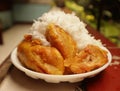 a plate of delicious fried banana sticky rice that is freshly cooked and still warm