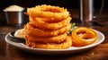 Plate of delicious fried onion loops