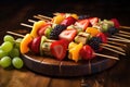 A plate of delicious fruit skewers featuring juicy grapes and fresh strawberries, Fresh fruit skewers artfully arranged on a