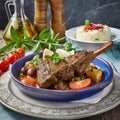 A plate of Greek kleftiko marinated lamb.