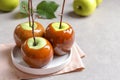 Plate with delicious green caramel apples Royalty Free Stock Photo