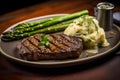 Grilled ribeye steak steak with asparagus and mashed potatoes on plate. Generative AI Royalty Free Stock Photo
