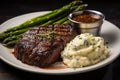 Grilled ribeye steak steak with asparagus and mashed potatoes on plate. Generative AI