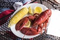 Plate of delicious lobster with indian corn