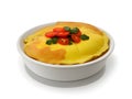 plate of delicious omelet with tomato and herbs