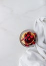 Plate with delicious pancakes with raspberries and berry sauce on white background. Top view copy space