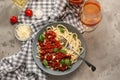 Plate with delicious pasta bolognese and wine on grey table Royalty Free Stock Photo