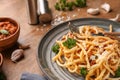 Plate with delicious pasta bolognese on wooden table, closeup Royalty Free Stock Photo