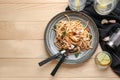 Plate with delicious pasta bolognese on wooden table, top view Royalty Free Stock Photo