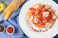 Plate of delicious pasta with mushrooms on table Royalty Free Stock Photo