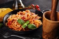 Plate of delicious spaghetti Bolognaise or Bolognese with savory minced beef and tomato sauce garnished with parmesan Royalty Free Stock Photo