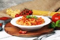 Plate of delicious spaghetti Bolognaise or Bolognese with savory minced beef and tomato sauce garnished with parmesan Royalty Free Stock Photo