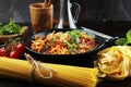 Plate of delicious spaghetti Bolognaise or Bolognese with savory minced beef and tomato sauce garnished with parmesan Royalty Free Stock Photo