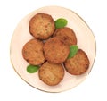Plate of delicious vegan cutlets and spinach isolated on white, top view Royalty Free Stock Photo