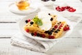 Plate with delicious waffles with berries and ice cream. Close-up Royalty Free Stock Photo