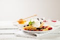 Plate with delicious waffles with berries and ice cream Royalty Free Stock Photo