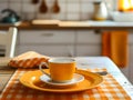 Plate with division for portions and cup for small children on table in kitchen