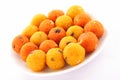 Plate of Diwali sweets called Motichoor Ladoo in white background.