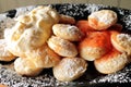 A plate of Dutch Poffertjes Royalty Free Stock Photo