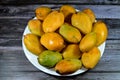 Plate of Egyptian fresh mango fruit with tropical delicacy, mangoes are nutritionally rich fruit with distinctive flavor, smell, Royalty Free Stock Photo