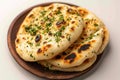 Plate elegance Isolated presentation of naan, a classic Indian bread