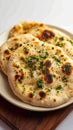 Plate elegance Isolated presentation of naan, a classic Indian bread