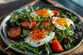 A plate featuring a colorful salad made with fresh eggs and ripe tomatoes, A satisfyingly simple yet delicious meal option Royalty Free Stock Photo