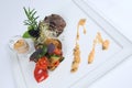 Plate of fine dining meal - tender ostrich fillet Royalty Free Stock Photo