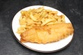 A plate of fish and chips from an English fish and chips shop Royalty Free Stock Photo