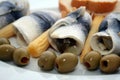 Plate of fish with olives Royalty Free Stock Photo
