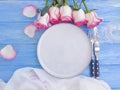 Plate flower  rose on wooden background rustic Royalty Free Stock Photo