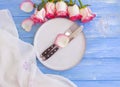 Plate flower rose on wooden background rustic spring Royalty Free Stock Photo