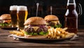 A plate of food with a bottle of beer