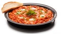 A plate of food with bread and eggs, tasty menemen, Turkish food.