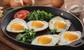 A plate of food featuring a fried egg on top, showcasing a hearty and satisfying meal.