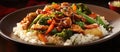 a plate of food with rice and vegetables on a table