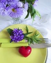 Plate, fork, knife, heart, symbol menu romance decor design arrangement chrysanthemum flower on white wooden background Royalty Free Stock Photo
