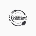 Plate with fork and spoon. Restaurant logo Royalty Free Stock Photo