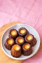 A plate of french pastries, CanelÃÂ©s de Bordeaux